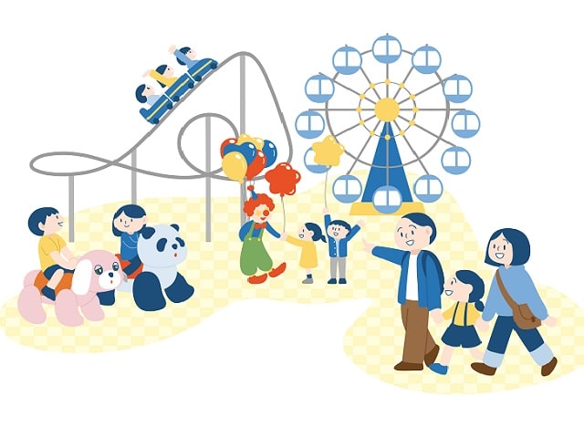 遊園地 テーマパークで遊ぶ人々